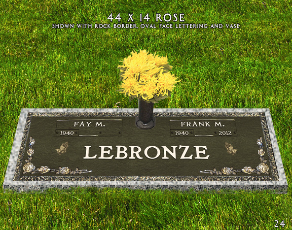 Selection guide plate showing a bronze marker mounted on a granite base with a vase